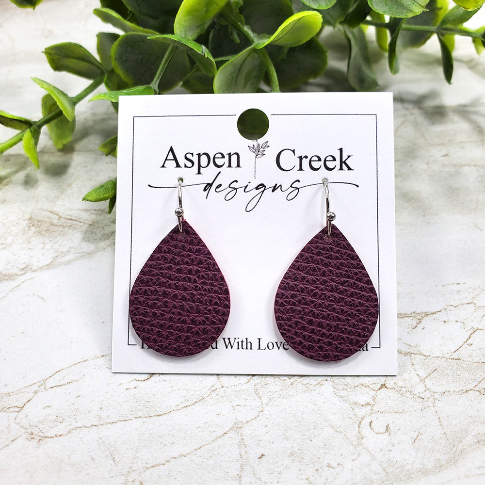 Purple on sale leather earrings